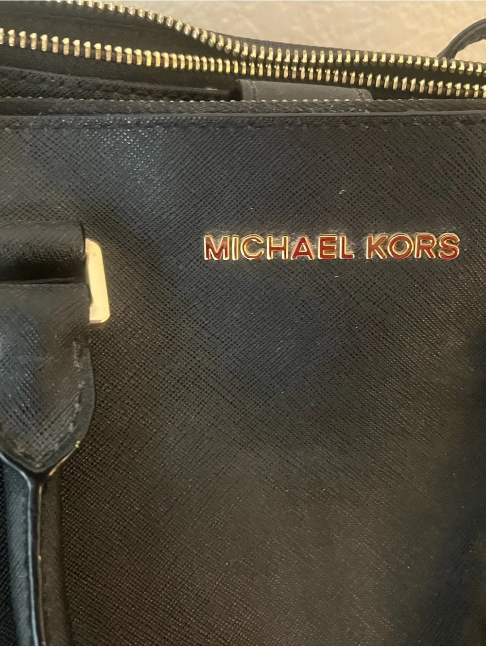 Michael Kors Black Saffiano Leather Tote with Gold Hardware.